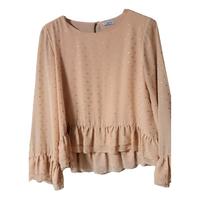 blusa con fantasia maniche lunghe con balze 