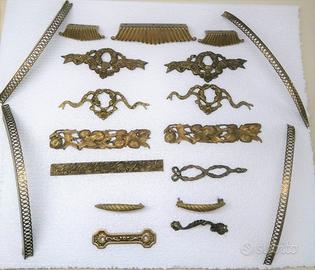Fregi in bronzo vintage