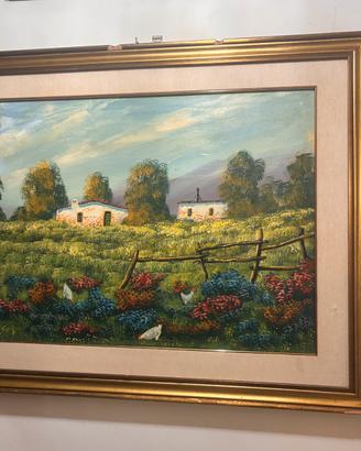 Paesaggio con casale e campo fiorito