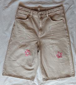 Pantaloni ricamati a mano
