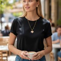 Set orecchini e collana foglia dorata con zirconi