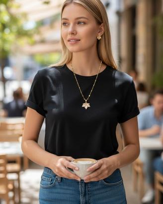 Set orecchini e collana foglia dorata con zirconi