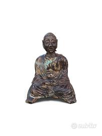 Scultura monumentale Buddah antico in terracotta
