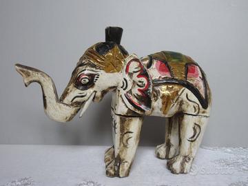 Elefante in legno. Altezza 17,5cm lunghezza 24cm