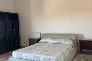 Camera matrimoniale in appartamento condiviso