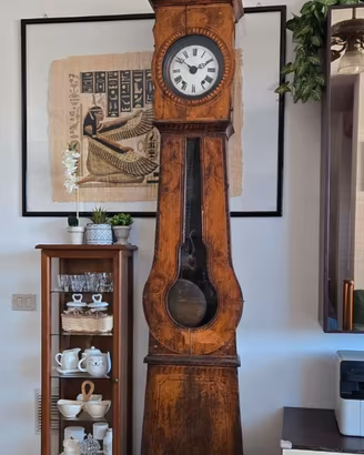Orologio antico a pendolo