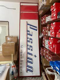 Insegna per attività