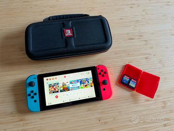 Nintendo Switch + 5 Giochi + Dock + Custodia