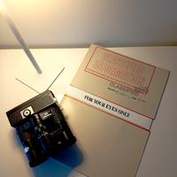 Binocolo fotocamera James Bond 