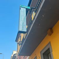 Insegna e tettoia al neon per hotel milano