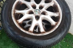 P. E, r. Mu. To cerchi in lega gommati