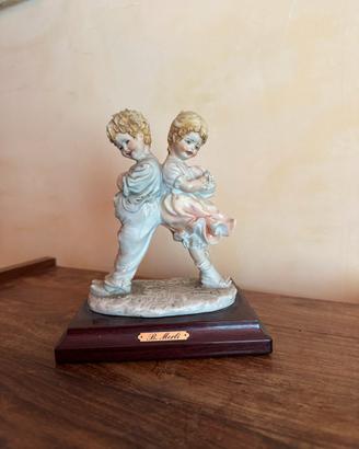 Statuetta vintage in porcellana Capodimonte