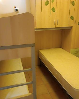 cameretta a ponte a L con letti 