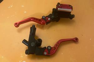 Leve frizione e freno universali regolabili