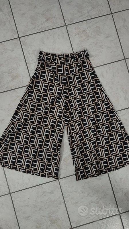 Pantaloni a zampa hot sale pitonati bershka