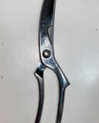 trinciapollo in acciaio inox