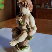 Putto in finissima porcellana Capodimonte,