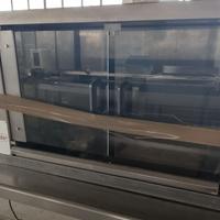 girarrosto per polli : pizzeria o gastronomia