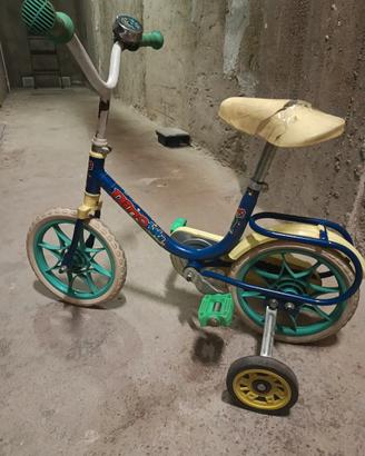bicicletta bambino e pelouche