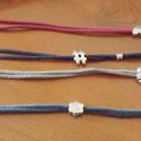 4 Braccialetti CONAD diverse fantasie