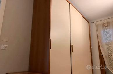 Armadio a tre ante scorrevoli