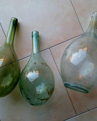 Tre fiasche in vetro vintage