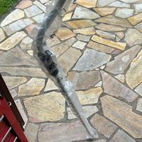 Asta con manovella per apertura/chiusura tenda.