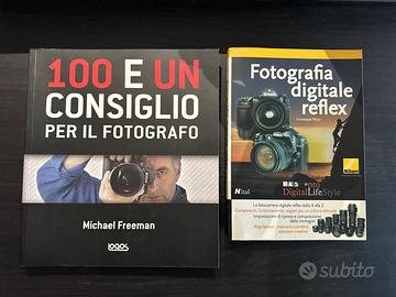 Coppia di libri di fotografia e reflex digitale