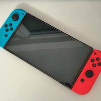 Nintendo Switch oled + custodia + accessori