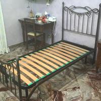 Letto in ferro battuto e reti