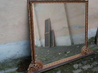 DUE SPECCHI : a) Grande antico, b) tondo anni '60