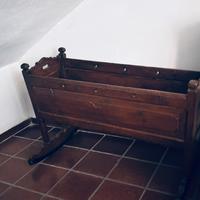 Culla in legno piede rotto