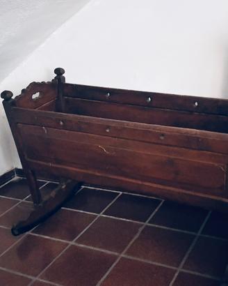 Culla in legno piede rotto