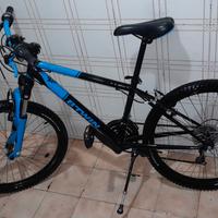 Bici Btwin Rockrider 500.
Cambio Shimano 3x6.