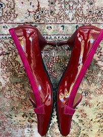 Scarpe tipo mocassini gommini Tod’s tacco basso