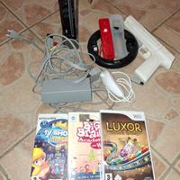 Nintendo Wii con accessori e giochi.