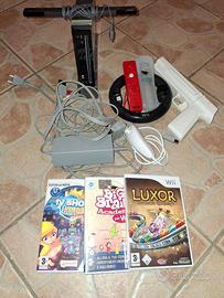 Nintendo Wii con accessori e giochi.