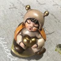 Bambino coccinella con cuore Thun