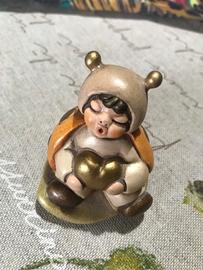 Bambino coccinella con cuore Thun