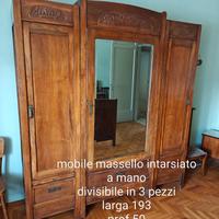 Camera in legno massello intarsiata a mano