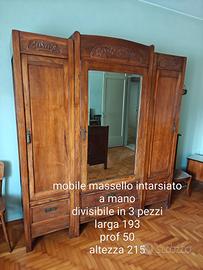 Camera in legno massello intarsiata a mano