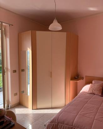 camera a Patti con letto, armadio, cassettiera