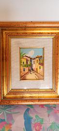 Quadro dipinto con cornice dorata