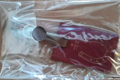 etichetta , portachiavi  gucci