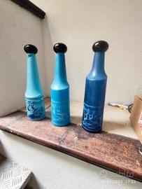 tre bottiglie di Savador Dalì 