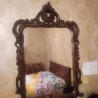 specchiera in legno intagliato 