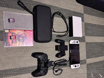 Nintendo Switch OLED + 2 giochi + controller