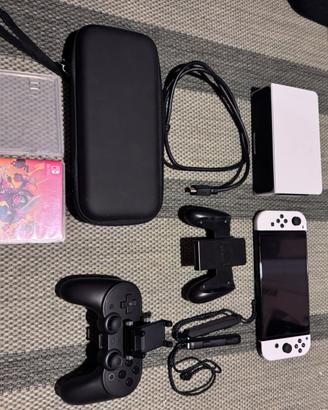 Nintendo Switch OLED + 2 giochi + controller