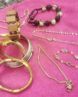 Orologio, cavigliere, bracciali. lotto 674/L
