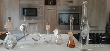 8 Bottigline di Grappa in vetro soffiato Vintage